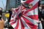 韓国の市民団体、駐韓日本大使館前で剃髪式と旭日旗引き裂きパフォーマンス…原発処理水放流抗議