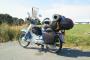 天気良い日に車乗ってて旅仕様バイクとすれ違うとさ