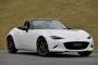 車庫ないのに布が張ってあるオープンカー買った……